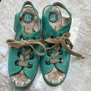 Green lace up Fly London wedges